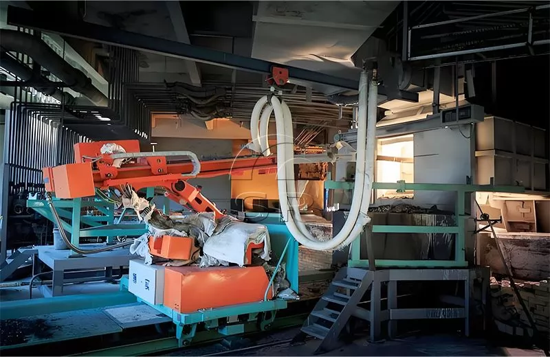 Введение в машину для заделки открытого ствола дуговой печи с погруженной дугой